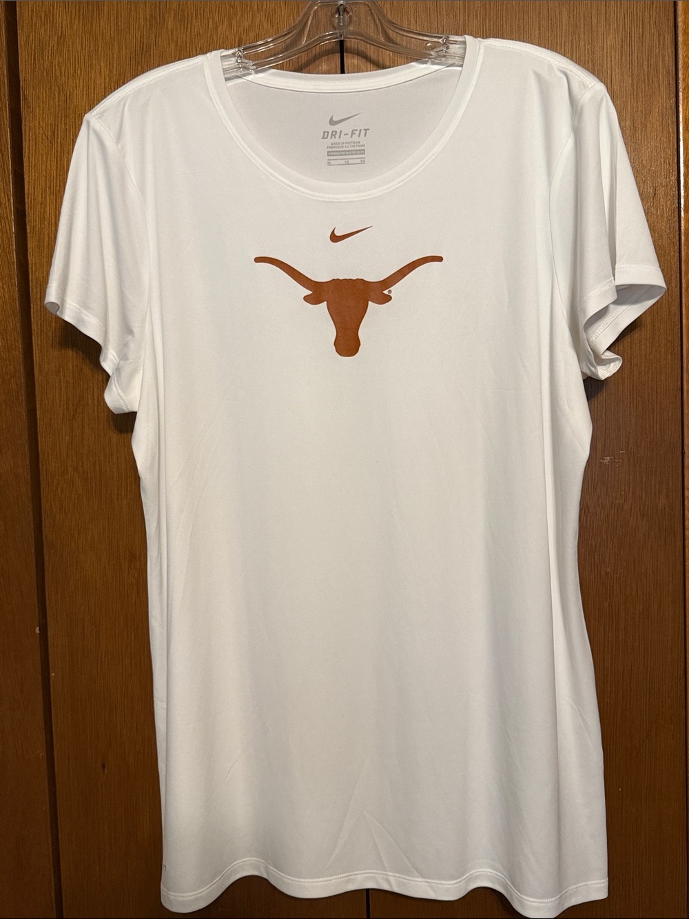 Nike Men’s White Short Sleeve Dri-FIT Tee with Burnt Orange Longhorn Logo